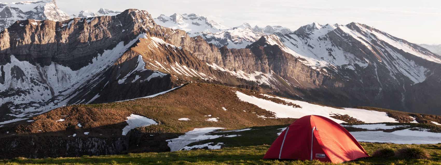 tent-by-the-mountain